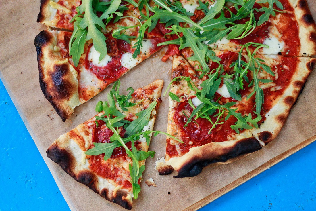 Pizza with rocket salad